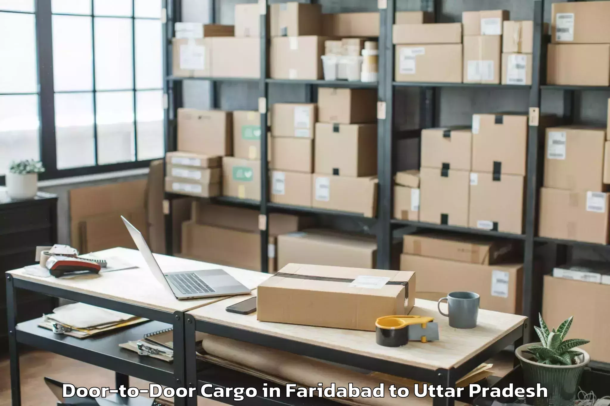 Top Faridabad to Khadda Door To Door Cargo Available